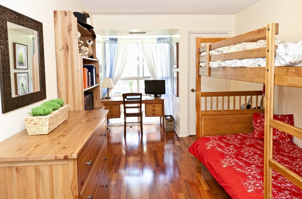 bedroom with hardwood floor and bunk beds