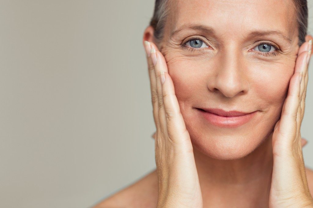 middle aged woman with healthy skin