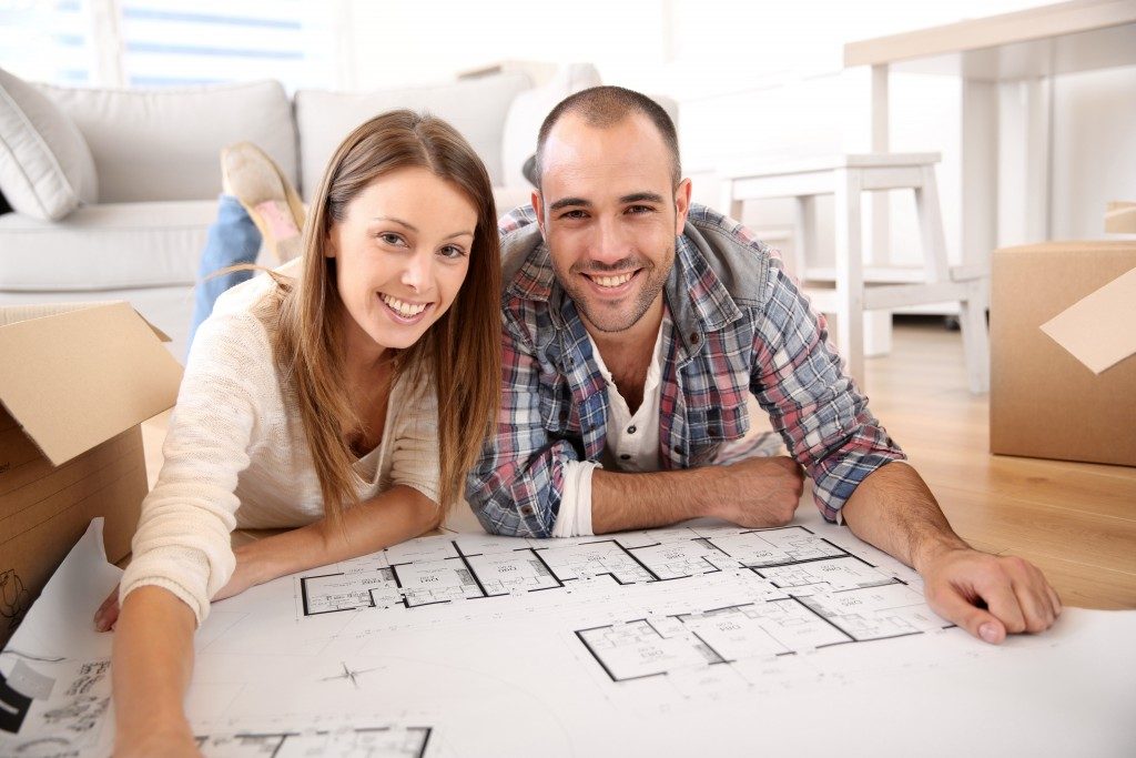 Couple looking at house floor plan