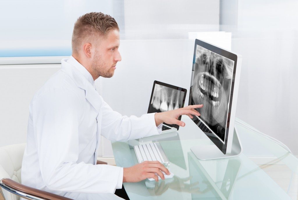 doctor looking at an x-ray