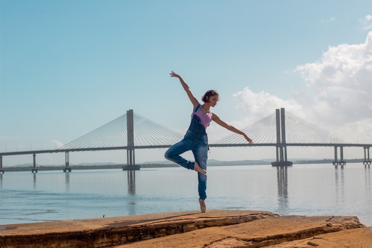 doing yoga by the coast