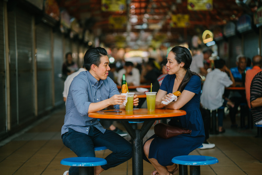 couple eating at a food court