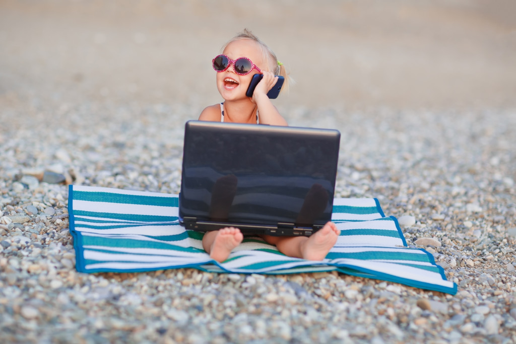 child working at the beach concept