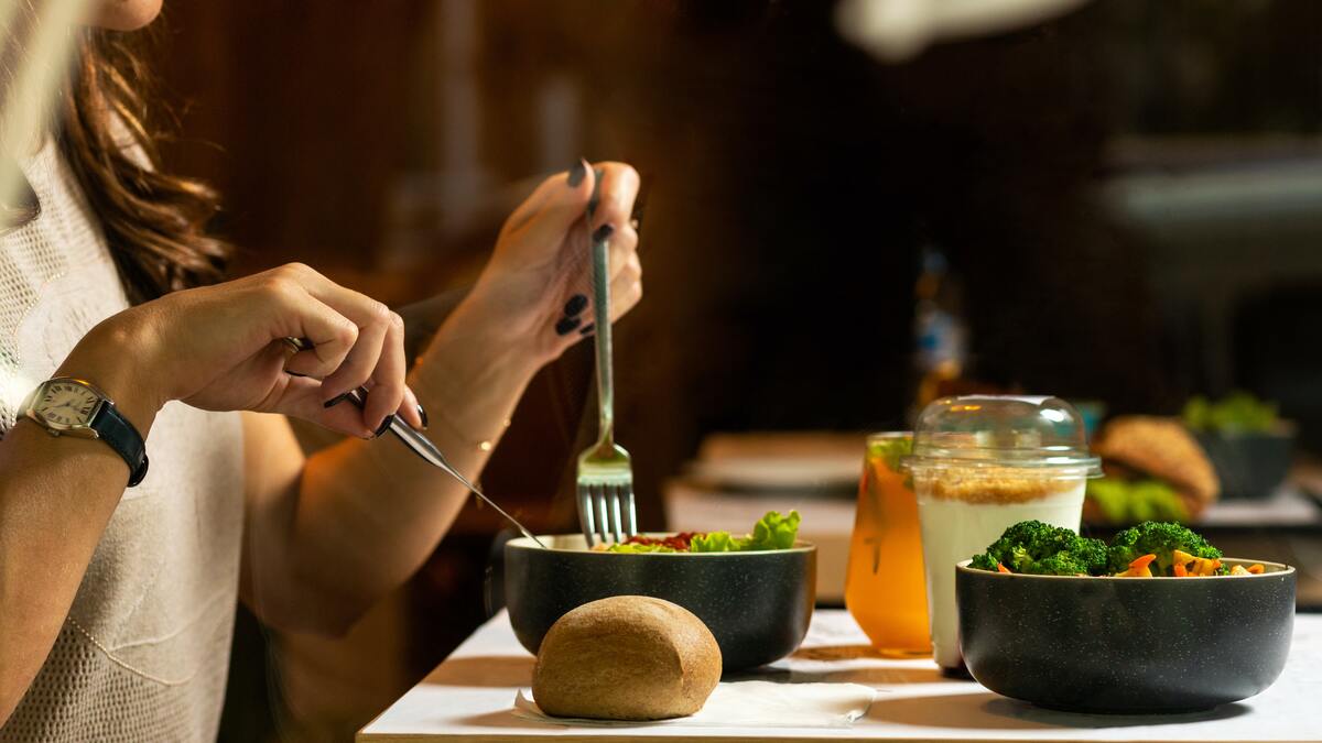 woman eating in a restaurant