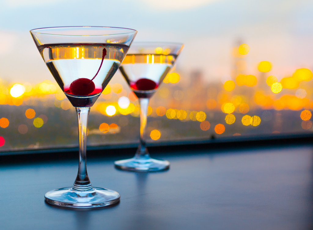 cocktail glasses with city view