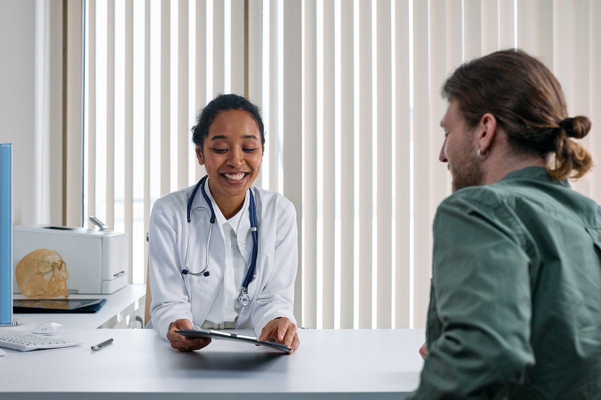 dentist talking to patient